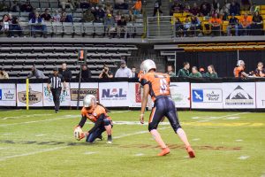 Michael Lima kicking an extra point for the Grizzlies. The Grizzlies are an indoor football team.