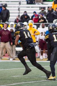 Senior Running Back, Marcus Cox, runs the ball down the field during the game against UL Monroe. The Mountaineers defeated UL Monroe with the final score being 47-17. Cox is now Appalachian State's all time leading rusher.