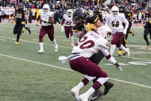 Senior Running Back, Marcus Cox, getting tackled while runing the ball during the game against UL Monroe. The Mountaineers defeated UL Monroe with the final score being 47-17. Cox is now Appalachian State's all time leading rusher. 