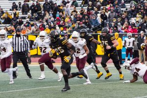 Sophomore Running Back, Jalin Moore, runs the ball towards the end zone during the game against UL Monroe. The Mountaineers defeated UL Monroe with the final score being 42-17 