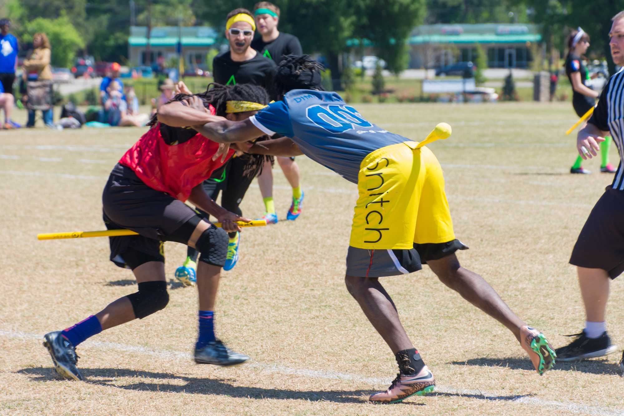 Chaser Brandon Poole wrestles with the snitch during the match against the Rain City Raptors