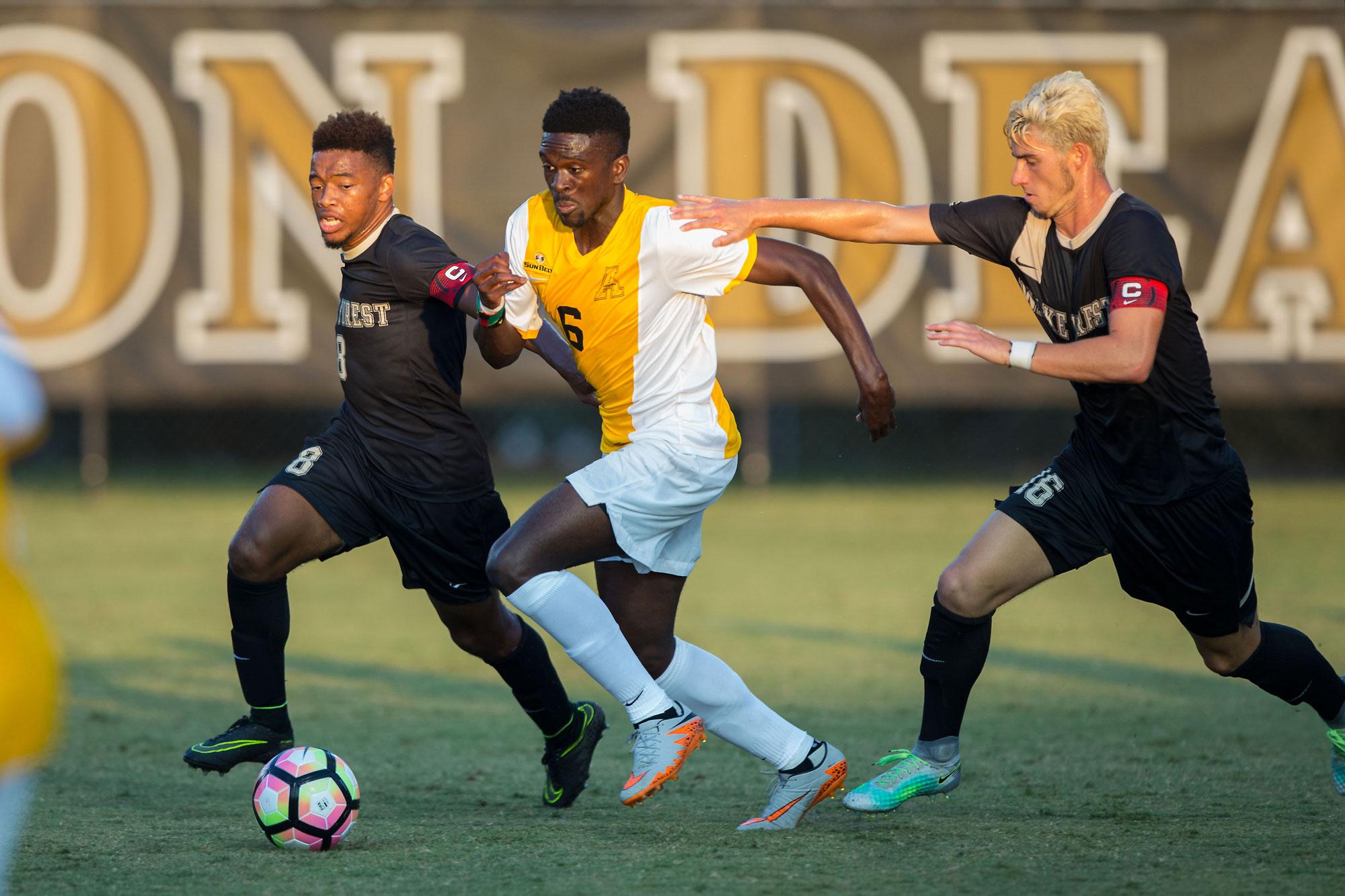 Junior Raheem Somersall battles for the ball during the game against Wake Forest Demon Deacons in Winston-Salem, North Carolina.  The Demon Deacons defeated the Mountaineers 3-0. 