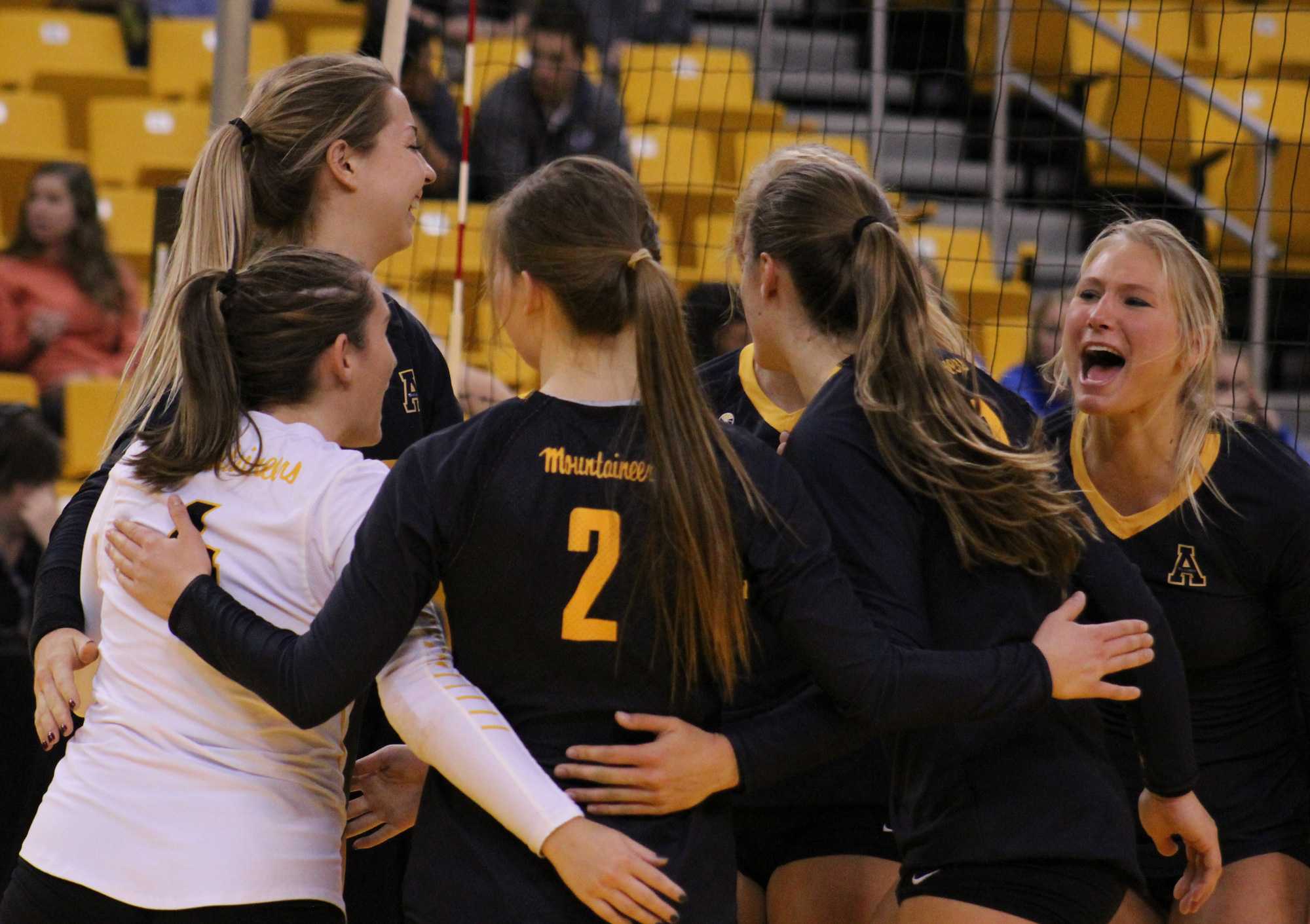 App State volleyball celebrate after winning a set during Friday's match against Georgia State.
Photo credit: Emory Kumpe, Photographer