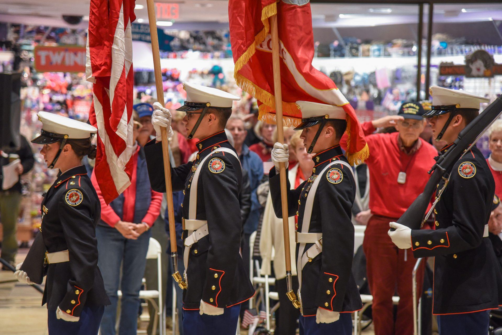 The Watauga High School MCJROTC performing the Retiring of Colors during The High Countrys Premiere Veterans Day Event. Many veterans and families of veterans gathered in the Boone Mall this past Saturday to honor those who have served our country.