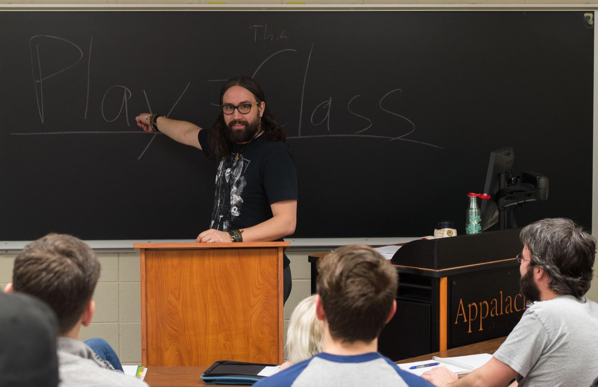 Department of Communication professor Mr. Mark Bentley lectures during his Videogame Discourse class in Walker Hall. Photo by Dallas Linger.