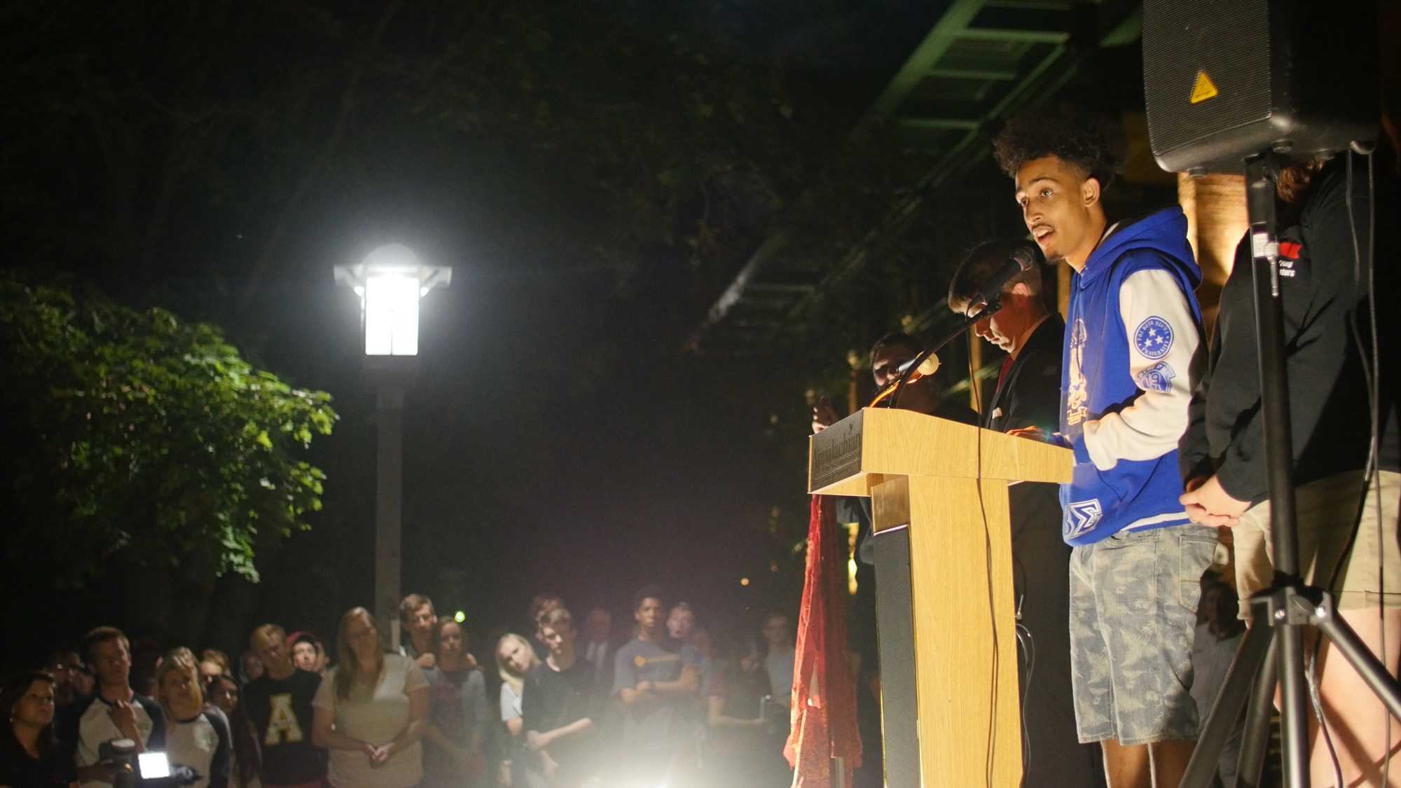 SGA President, Jalyn Howard, speaks about who he walks for during this year's Walk for Awareness. Photo by Maleek Loyd