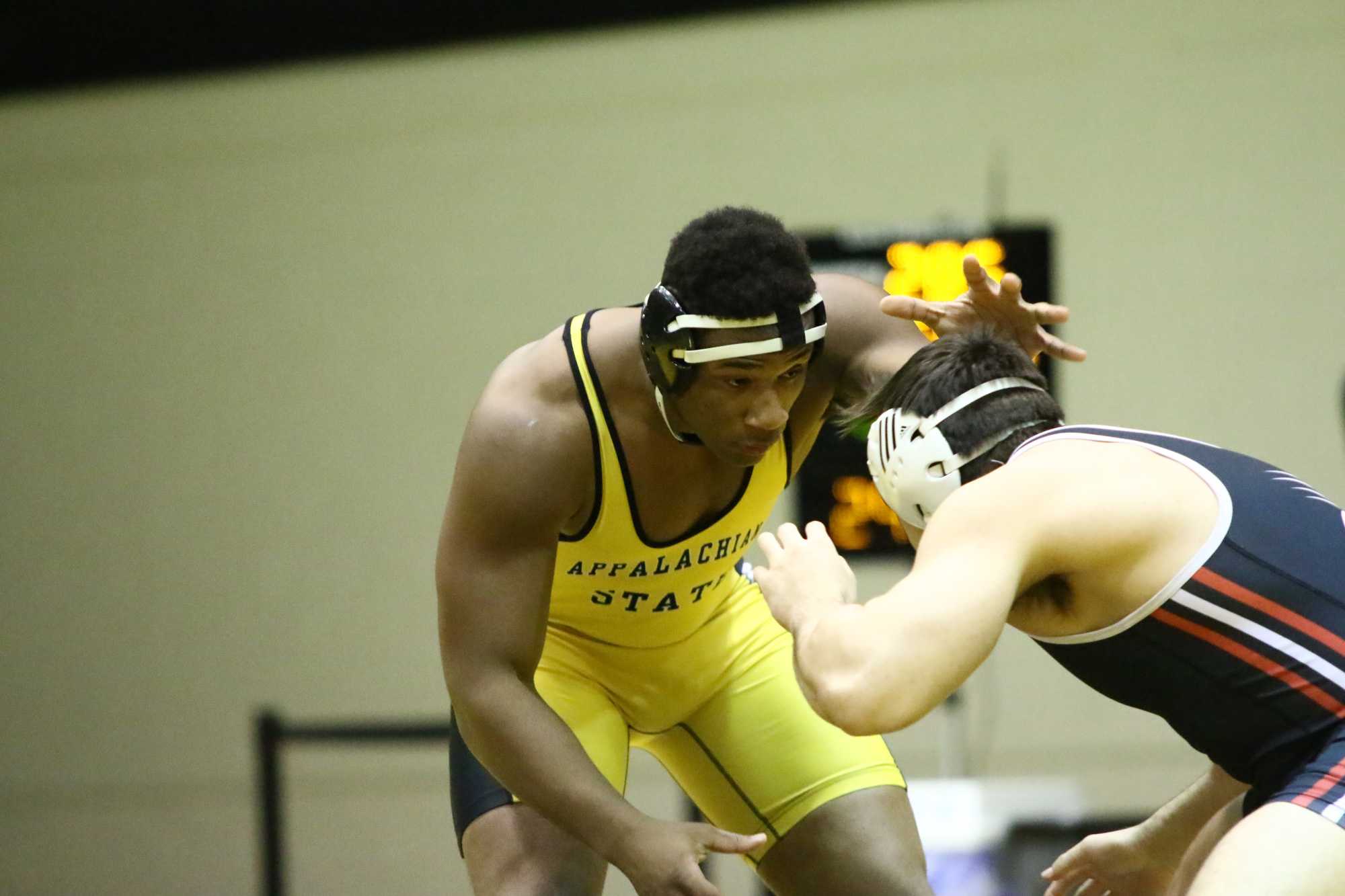 Denzel Dejournette prepares to take down his opponent during a match against SIUE. Photo courtesy Appalachian State Athletics.