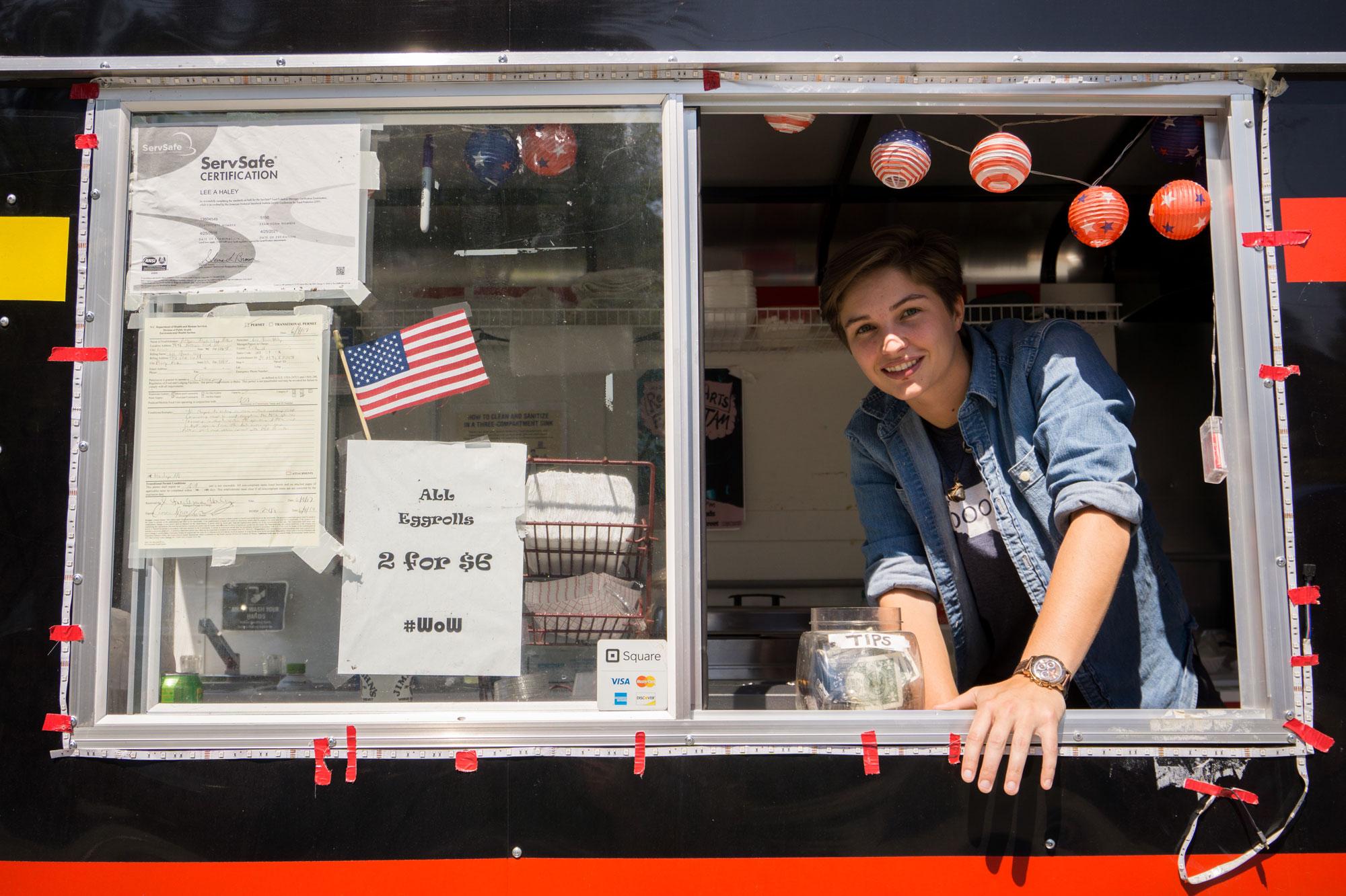 Boone resident Abbe Miller serves fresh, hot egg rolls from her food truck at the Reckless Art Fair.  The event brought together artists and entrepreneurs from Boone and beyond. 