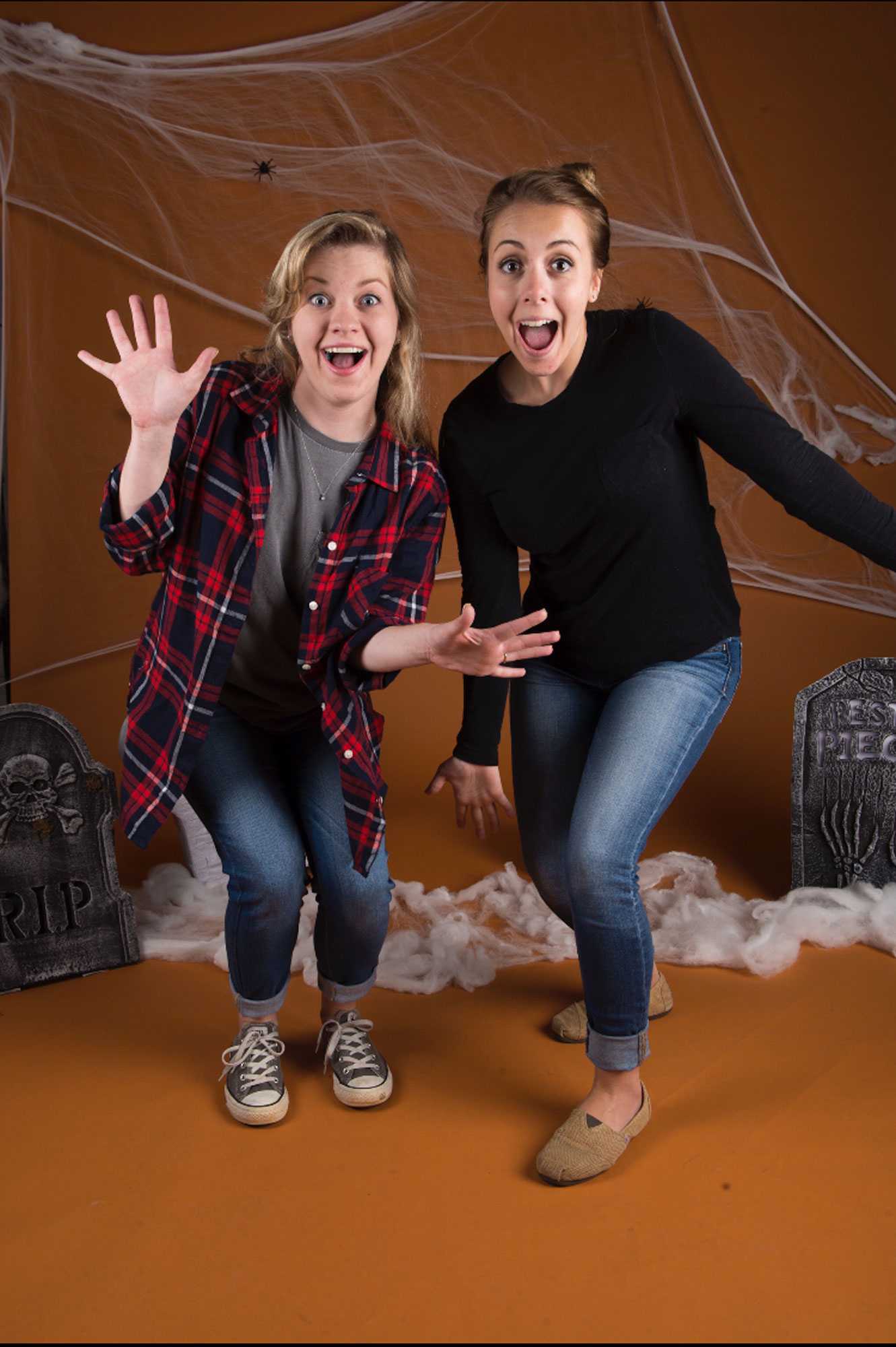 Members of the F/Stop Club, Darbey Younce and Sam Cooper, strike a pose at the annual Halloween Shoot in Boone Mall. 