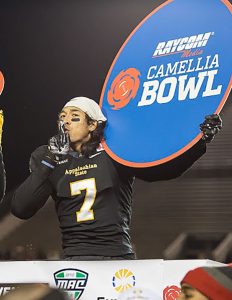 Former receiver Malachi Jones silences the crowd as he celebrates their 2015 Camellia Bowl victory. Jones is now a player for the High Country Grizzlies.