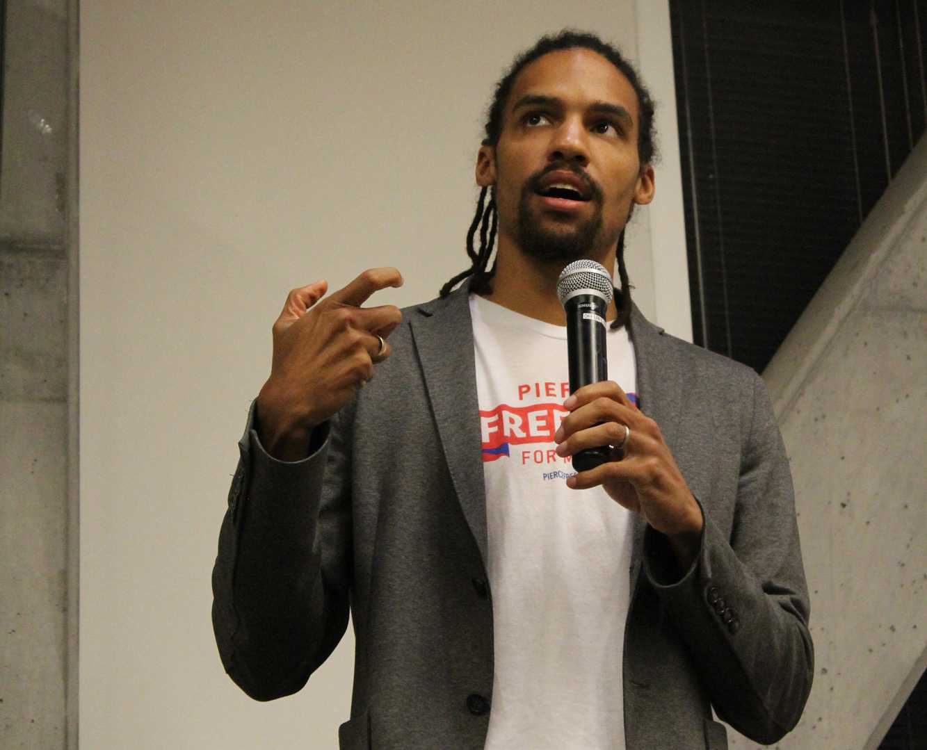 Pierce Freelon answers a students question about his favorite political and social influencers. Freelon is an artivist - an artist and activist - from Durham, North Carolina and spoke to students about deconstructing racism on September 14th.