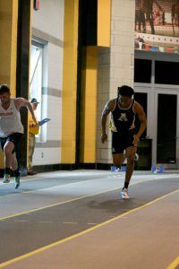 Jabari Johnson racing in the 55 meter preliminaries at the App State Indoor meet in January 