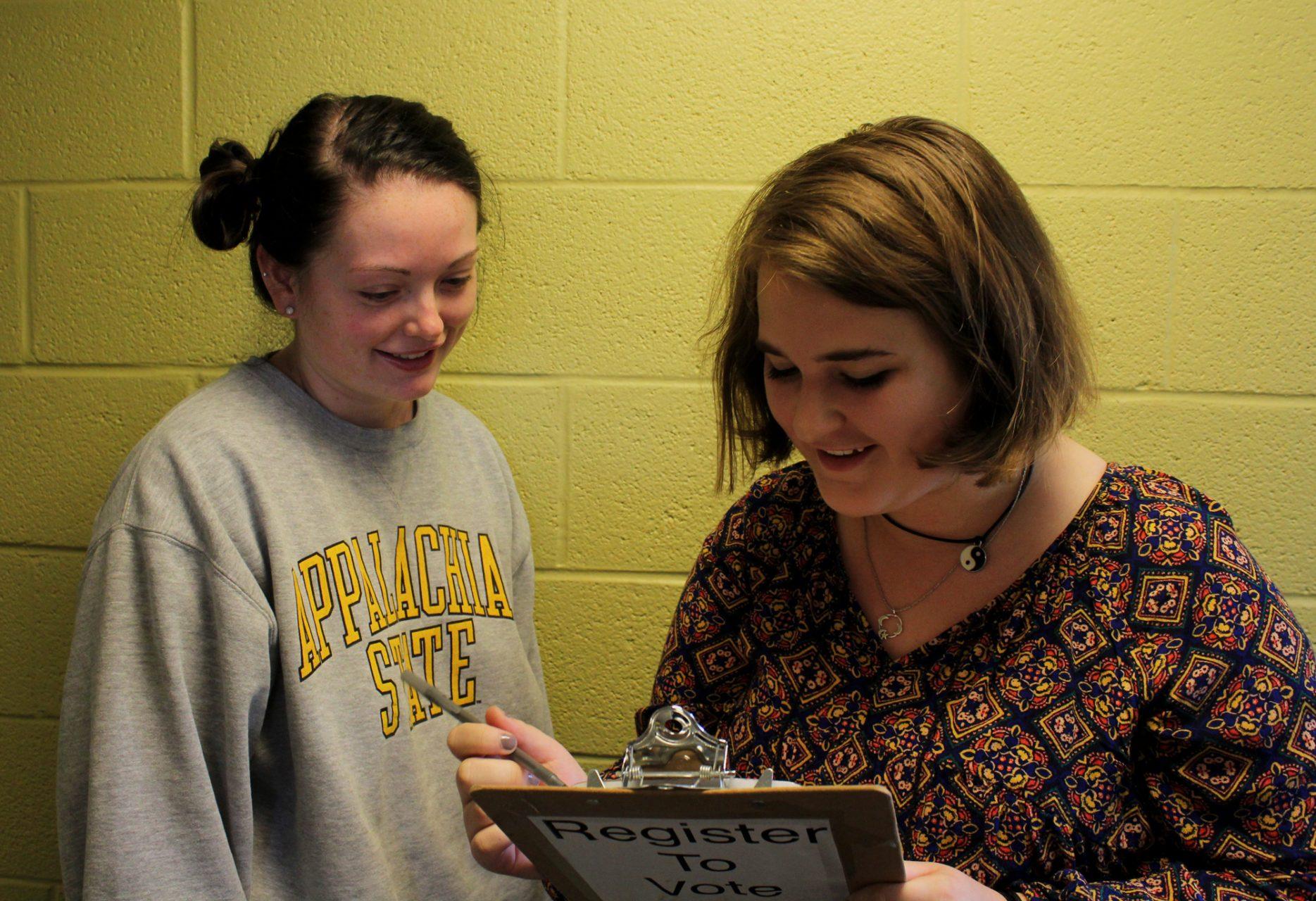 Freshman Maggie Behm helping Junior Logan Vann register to vote. There were several efforts throughout the month of September to register Appalachian students to vote in the upcoming Mayor and Town Council elections in November.
