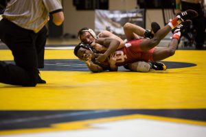 App State's Vito Pasone attempts to pin his opponent during his 7-5 loss.
