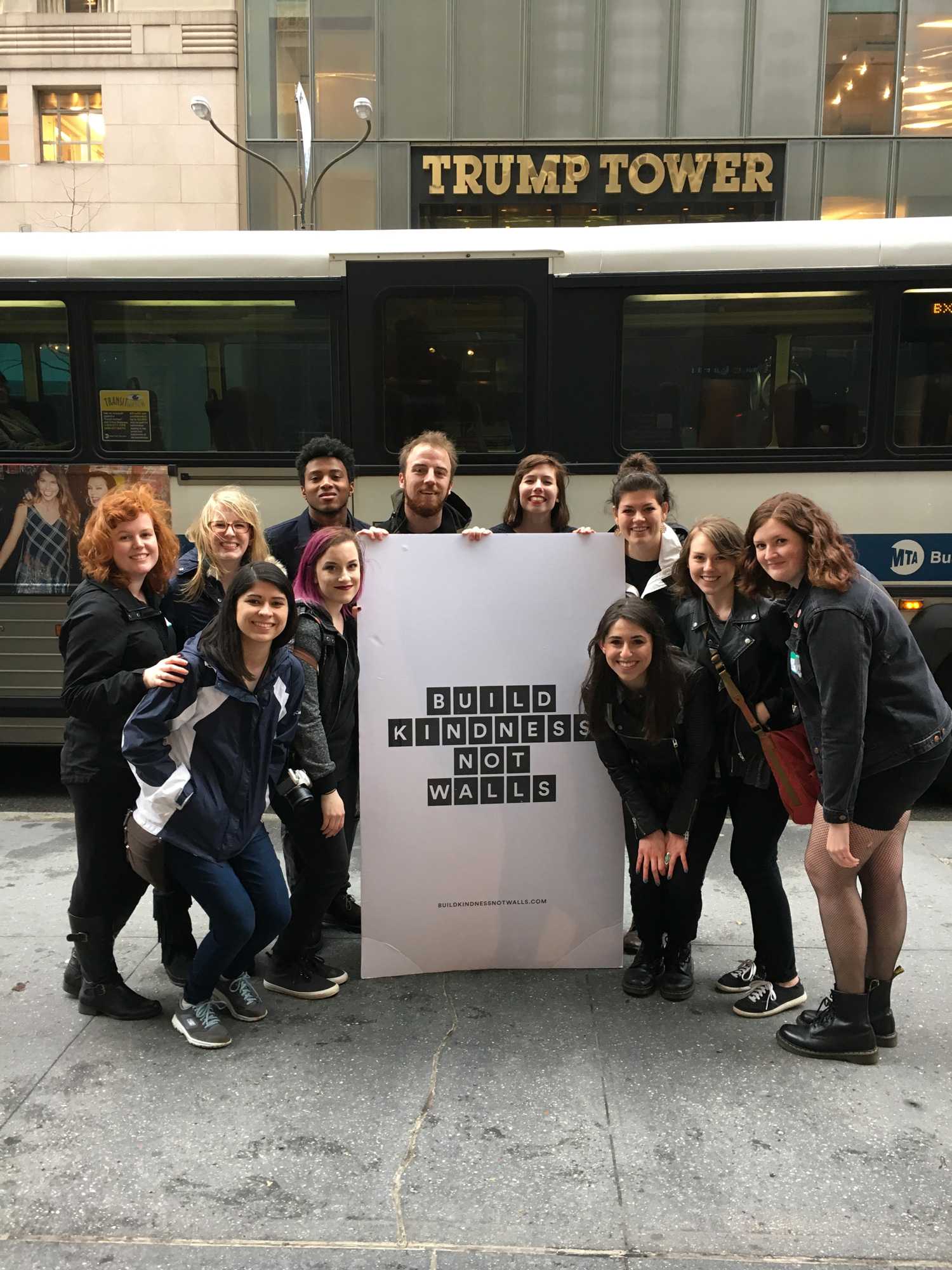 Appalachian State University students hold up a sign that reads “build kindness not walls,” in front of Trump Tower in New York City. Photo courtesy Rachel Bowles.