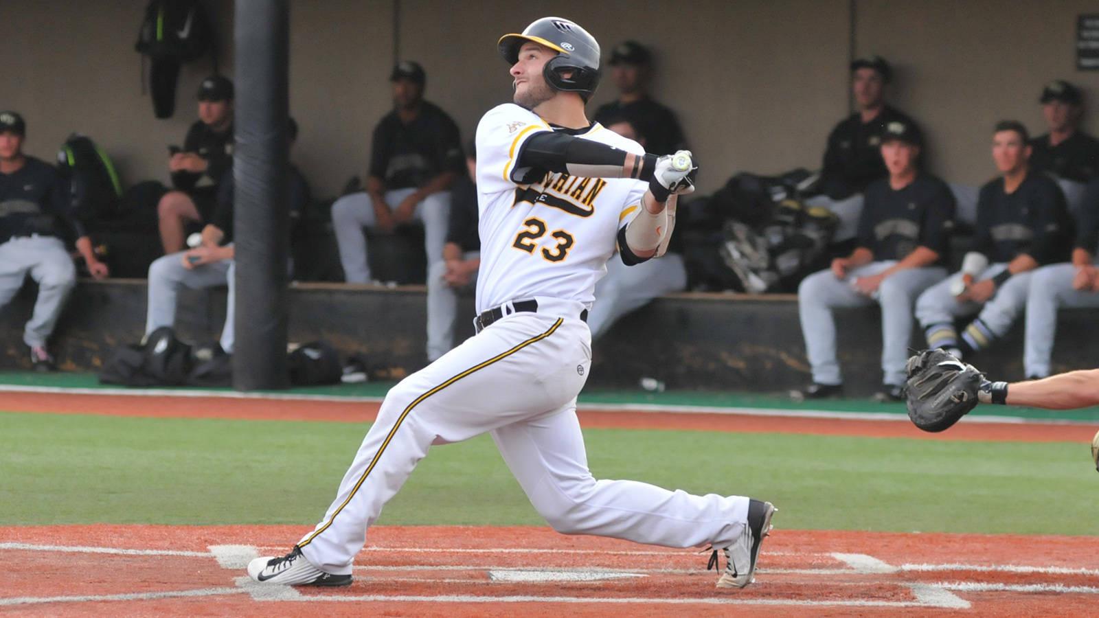 Senior right-handed pitcher and infielder Caleb McCann follows through his swing. Courtesy of DC Mayo; App State athletics