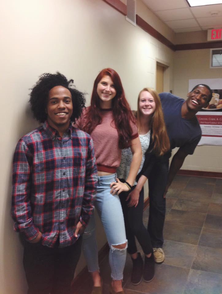 (left to right) co-creator Nathan Brown, graphic designer Alex Page, community outreach coordinator Mallory Colbert and co-creator and owner Eli Farmer. Photo courtesy ProMo.