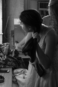 Freshman theatre arts major Rachel Buksbazen styles her hair backstage in preparation for her performance in the I.G. Greer Studio Theatre as a performer in the 24-hour Arts Festival presented by Playcrafters on Sunday, September 11. Buksbazen performed in the dance number "Out of Sight, Out of Mind," choreographed by junior dance studies major Phillip McRorie.