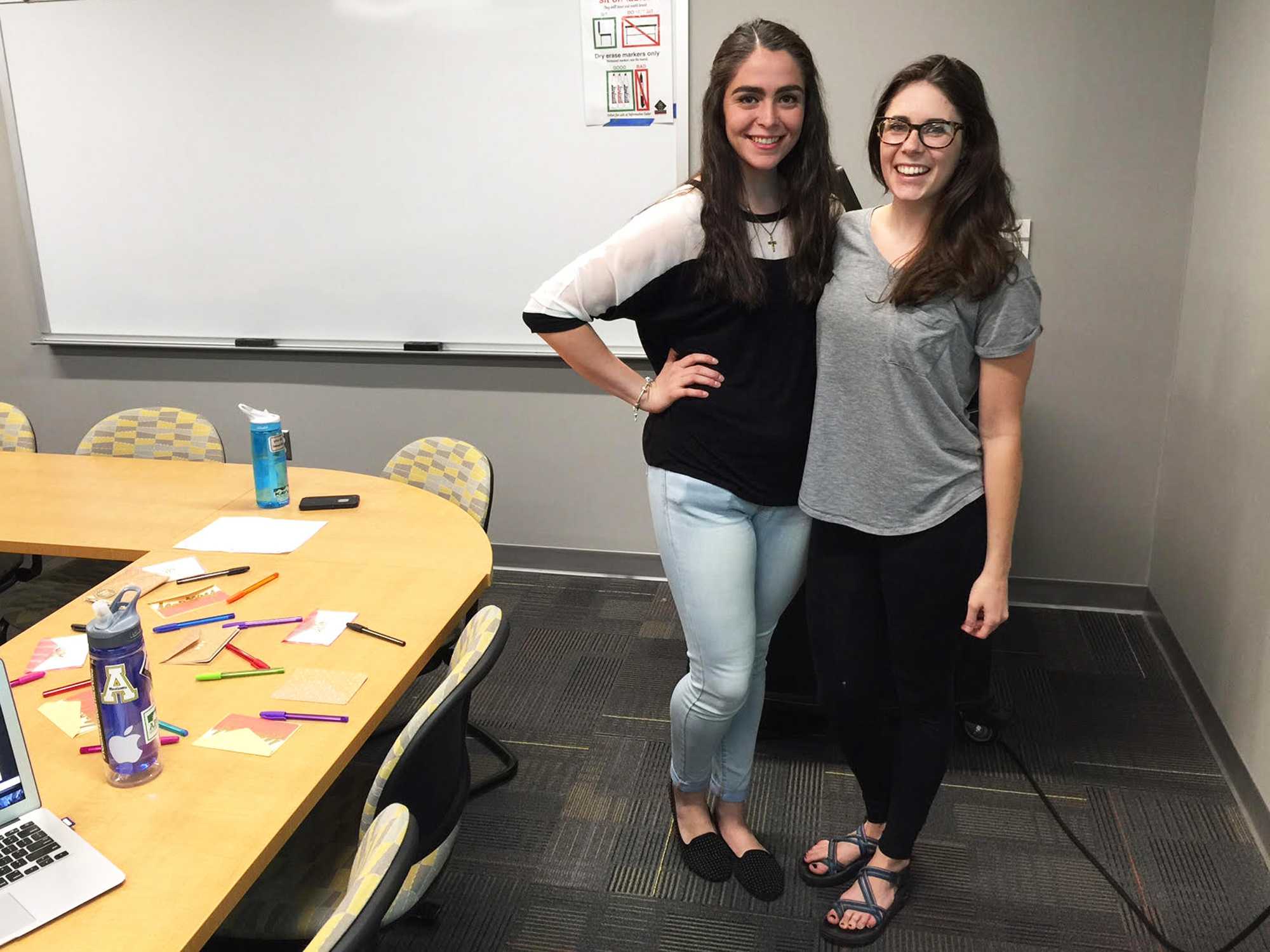 Two officers of the club, Junior Andrea Santoyo and senior Emily Bradley. The club meets every Monday at 6:15 pm and they use tangible acts of love to lift peoples moods and empower individuals.