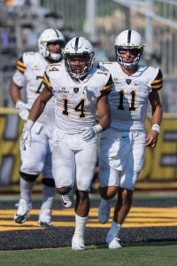 Marcus Cox after scoring one of his three touchdowns.