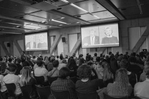 Students of all political stances meet in the Parkway Ballroom to watch the first Presidential Debate of 2016.