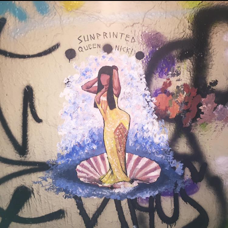 Nicki Minaj in the style of Sandro Botticelli’s “Birth of Venus” by Corryn Thompson in one of the expression tunnels on campus.