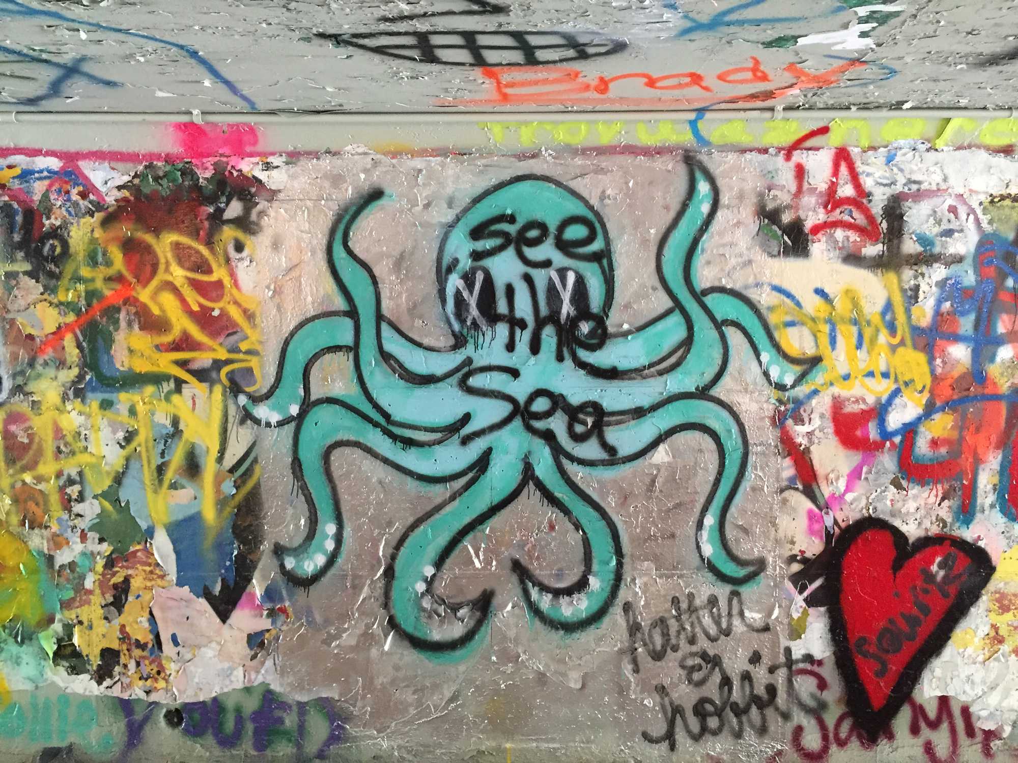 An octopus found in one of the expression tunnels with the phrase, “see the sea” painted over it. Artist unknown.