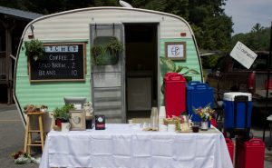 The Hatchet Coffee trailer. Hatchet Coffee is a company owned by Jeremy Parnell and Jeremy Bollman who used to be bakers at Stick Boy Bread Company together. At the market you can buy hot or cold drip coffee and coffee beans. The store is located next to Center 45 Climbing Climbing & Fitness on 200 Den Mac Dr where you can buy coffee as well as mugs.