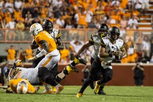 Lamb breaks away from defenders last week against Tennessee. Lamb rushed for a touchdown in the game.
