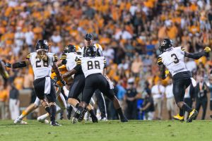 Law helps his teammates go for a tackle at Tennessee last week. Photo by Dallas Linger