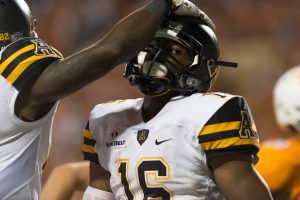 Junior wide receiver Zy Letman and senior wide receiver Jaquil Capel between plays against Tennessee.