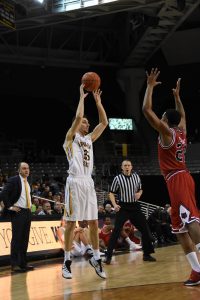 Fox coaching guard Jake Babic, one of the first players he recruited.