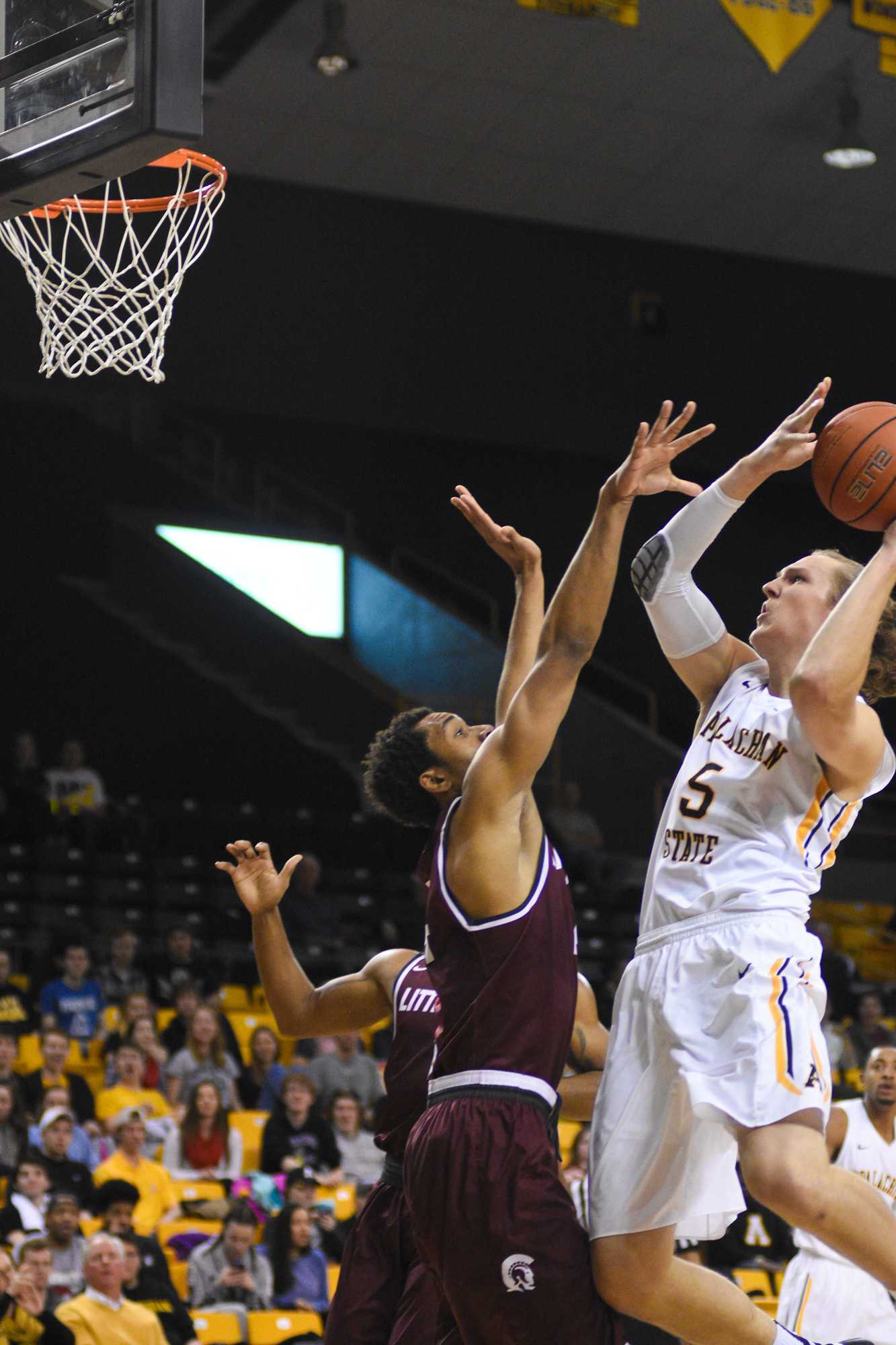 Junior foward, Griffin Kinney, shoots the ball during the game against Little Rock last season. He is one of the first players that Jim Fox recruited at Appalachian State.