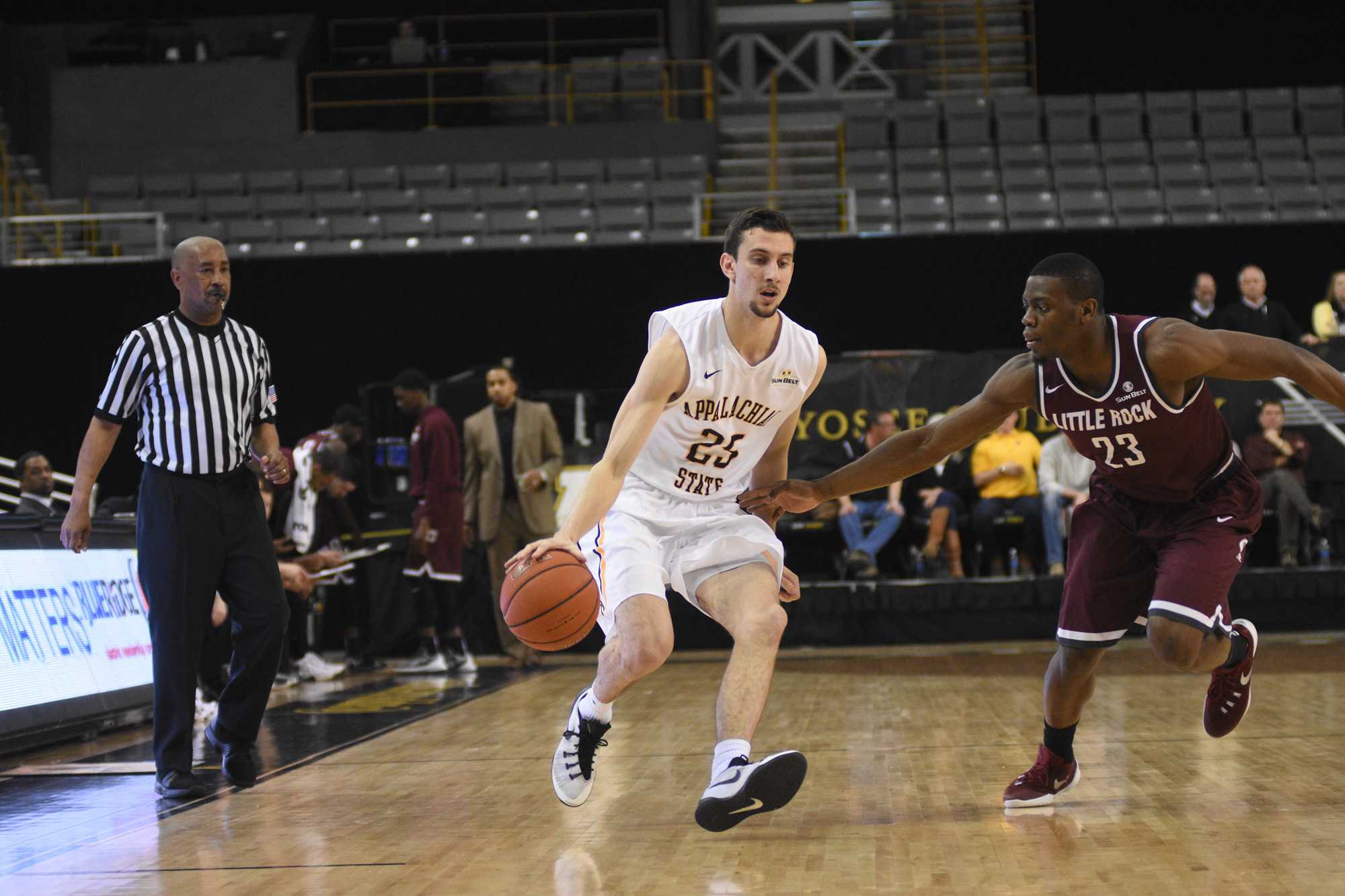 Junior guard, Jake Babic, dribbles the ball down the court during the game against Little Rock last season. He is one of the first players that Jim Fox recruited at Appalachian State.