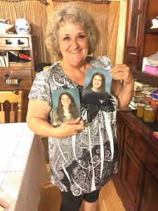 Joan Peters holds up photos of her grandchldrean, one of which wishes to soon attend App State. After nine years of working at App State Food Services, Joan Peters has retired back to her kitchen to care for her husband.