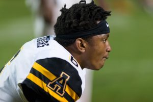 Junior wide receiver Shaedon Meadors rests after UT won the game in overtime last Thursday.