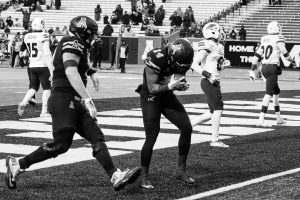 Senior running back Marcus Cox, scores a touchdown during the game against Monroe.