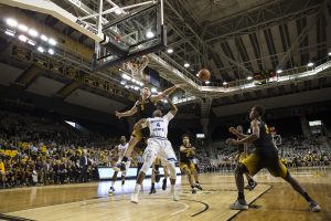 App State's Griffin Kinney rejects a Georgia State layup attempt. 