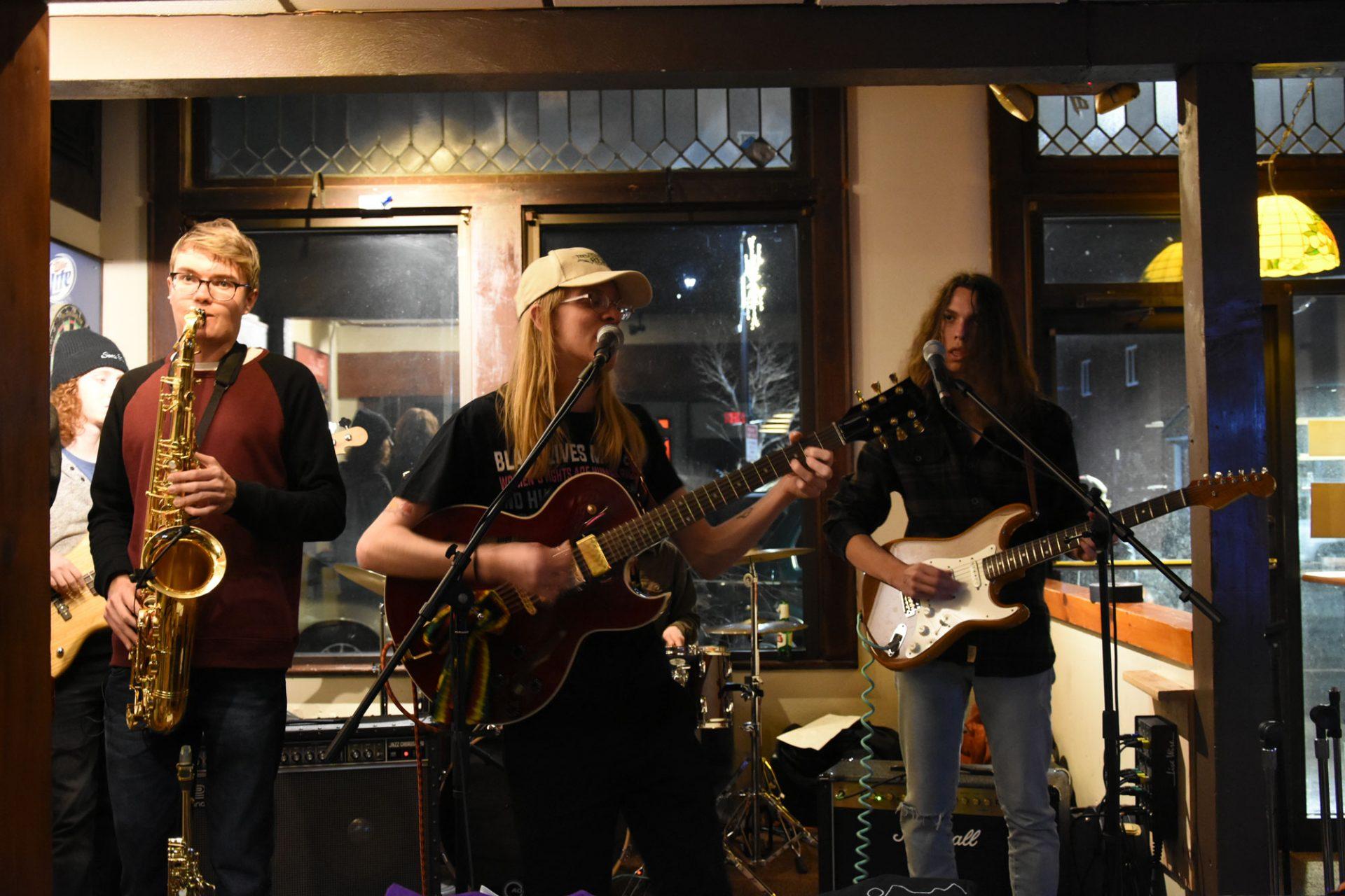 Evan Button & the Tribe singing Where Should I Go at Ransom in downtown Boone on Jan. 20.