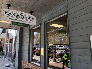 F.A.R.M Cafe is located on King Street next to Boone Belles. They sell local food with no set prices, only donations. 