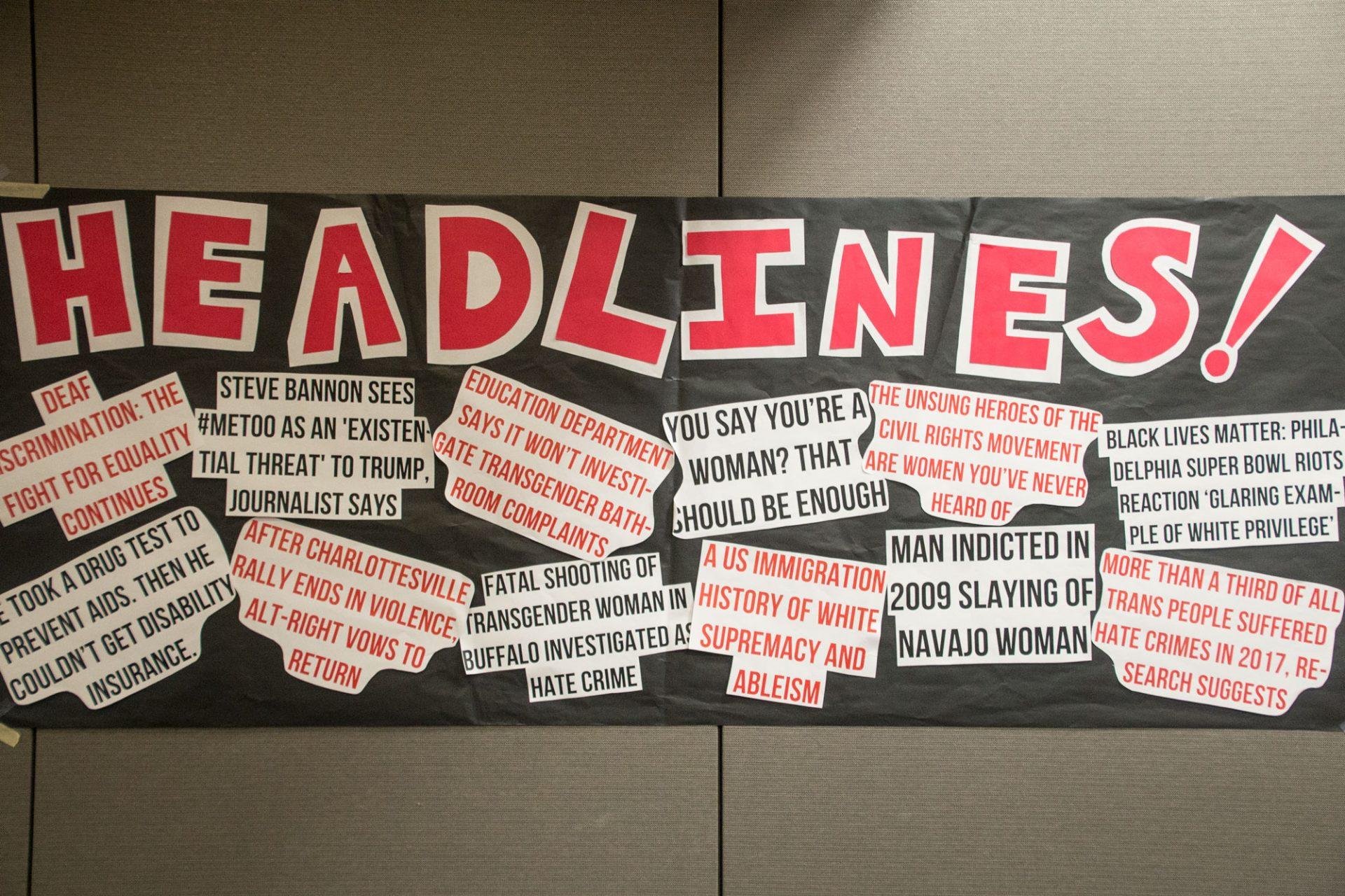 Headlines+hung+up+in+the+Blue+Ridge+Ballroom+for+the+Tunnel+of+Oppression.+