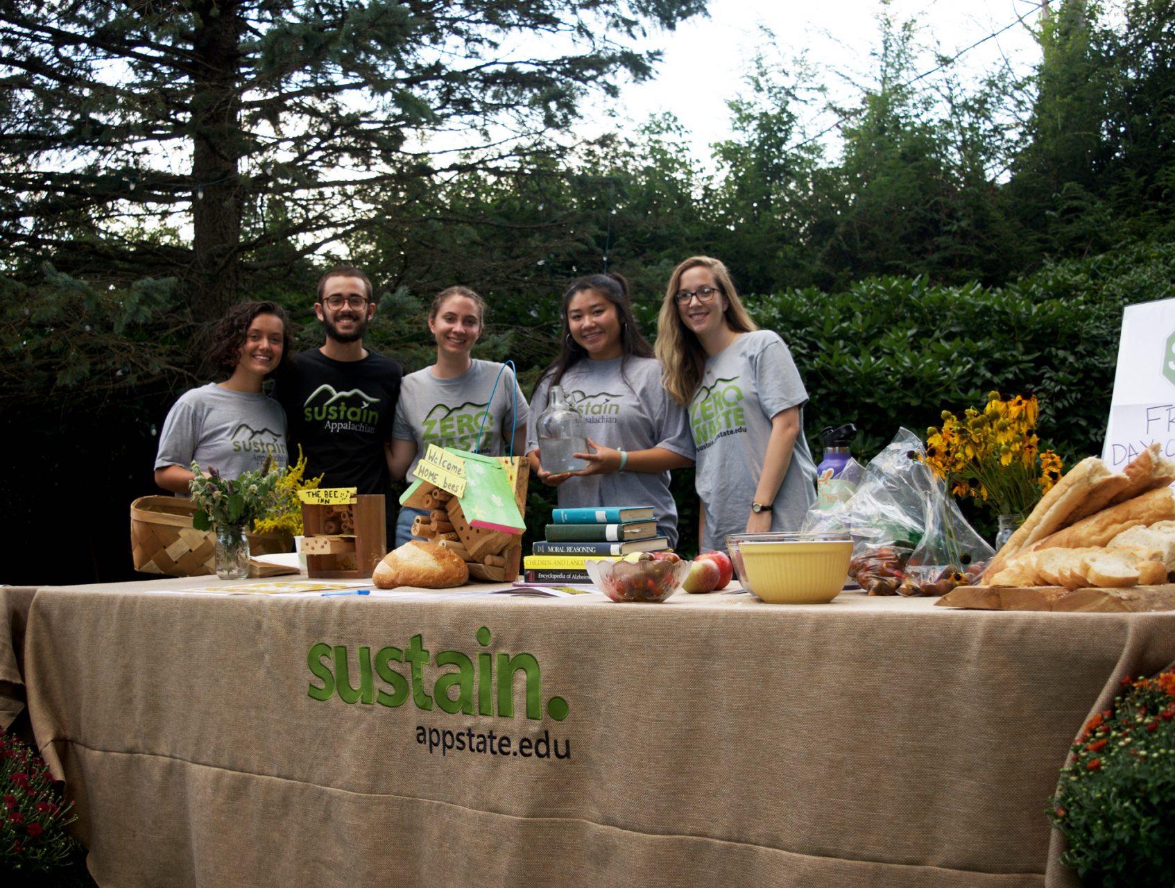 Members of App State's Sustainability program pose at Boone's Earth Awareness Festival on Friday. 