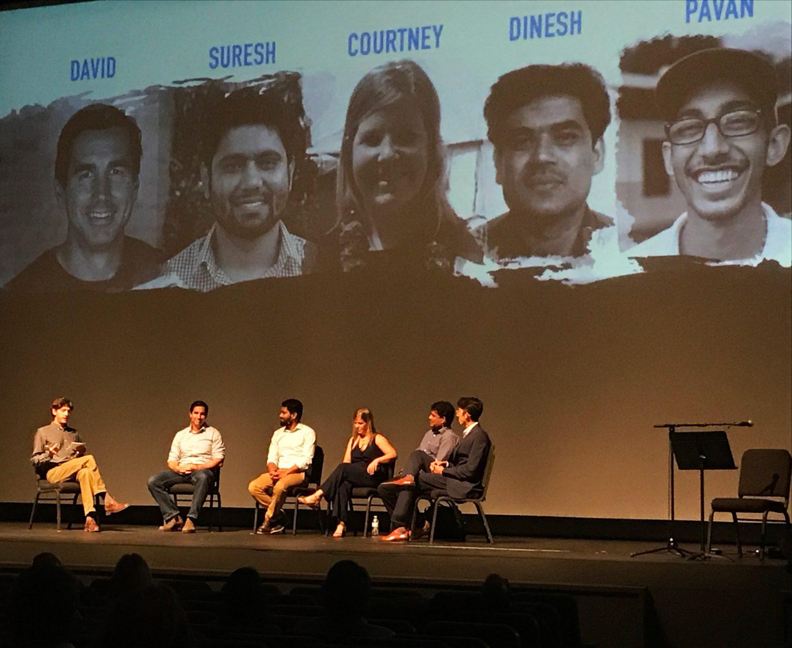 Suresh Niraula, Dinesh Paudel, David Cuthbert, Pavan Mudiam and Courtney Matta, employees of Wine to Water, are given the floor at the panel session at the Schaefer Center Thursday night. The panel focused on community impact, one of them being Boone.
