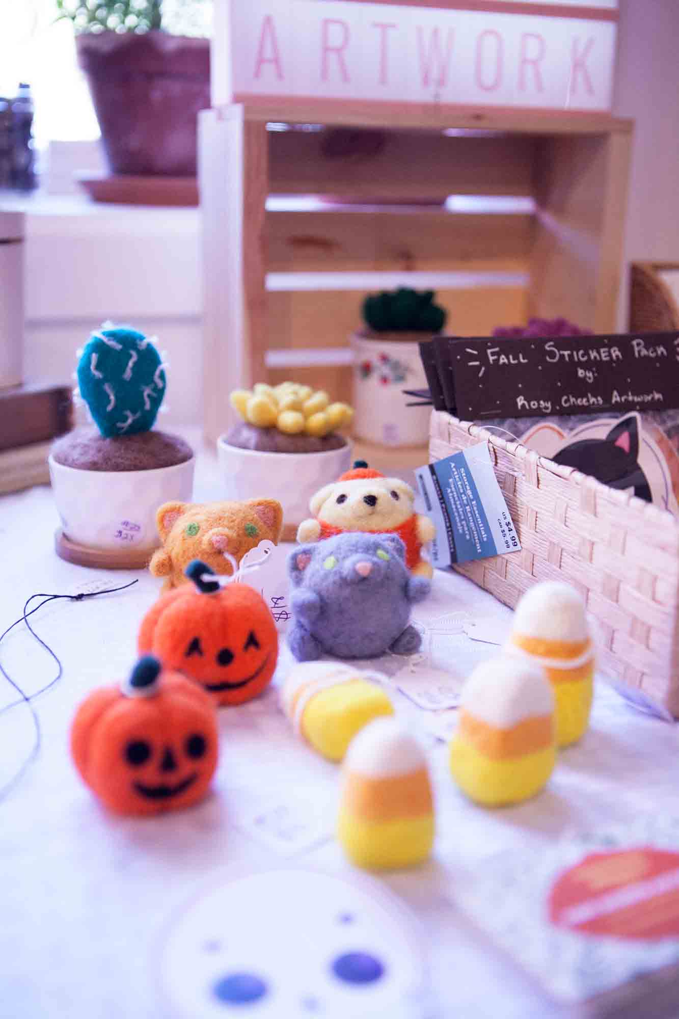 Halloween-themed felt pieces by Rosy Cheeks Artwork displayed for sale at this weekends Boone Pop Up.