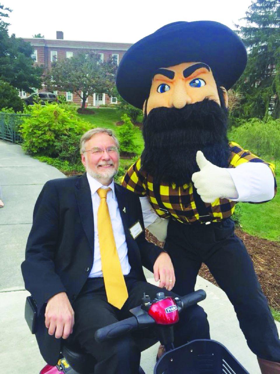 The new Dean of the Library, Dane Ward, poses with Yosef.
