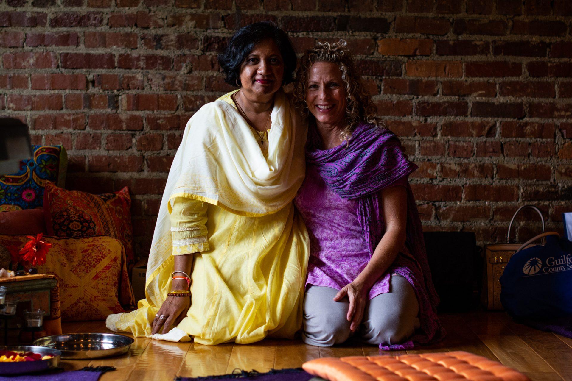 Christine Sita Dave (left) is the founder of EDGE, or Education for Girls Empowerment. Sita Daves longtime friend of Valerie Midgett (right) is the owner of Neighborhood Yoga.