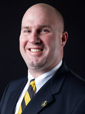 Justin Watts will be returning for his fifth season as a member of App States coaching staff and is one of four coaches being retained from former head coach Scott Satterfields staff. 