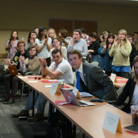 Sophomore Devin Mullins seated after discussions about his climate bill last February. Mullins plans to run for student body president.