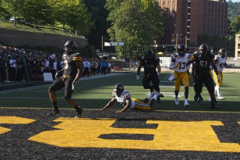 Junior running back Darrynton Evans celebrates after scoring a touchdown. Evans rushed for 99 yards and a touchdown and caught a pair of passes for 21 yards in the 42-7 win over ETSU. 