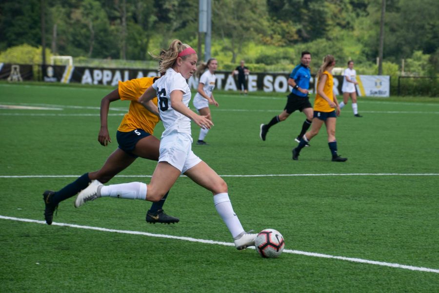 Freshman midfielder Hayley Boyles makes a play in the Mountaineers exhibition game against East Tennessee State on August 16. Photo by Lynette Files